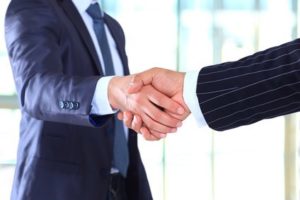 sales enablement close deal handshake